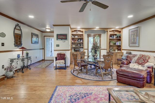 768 Lake Point Dr, Piney Flats, TN 37686 - living room featuring wood finished floors, built in features, ceiling fan, ornamental molding, and recessed lighting