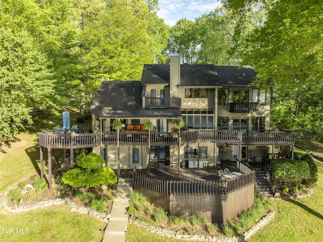 768 Lake Point Dr, Piney Flats, TN 37686 - back of property featuring stairs, a chimney, a deck, and a balcony