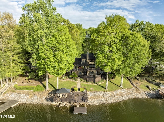 768 Lake Point Dr, Piney Flats, TN 37686 - exterior space with a boat dock, a water view, and a lawn