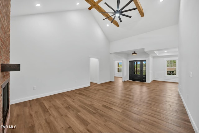330 Bogey Dr, Abingdon, VA 24211 - unfurnished living room featuring recessed lighting, wood finished floors, a brick fireplace, high vaulted ceiling, and ceiling fan
