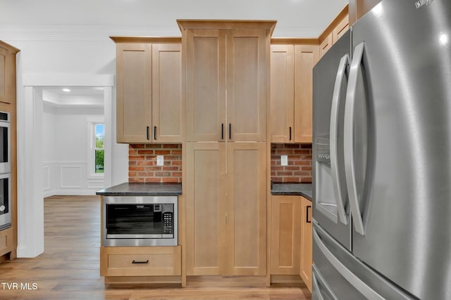 330 Bogey Dr, Abingdon, VA 24211 - kitchen with dark countertops, stainless steel refrigerator with ice dispenser, and light wood finished floors