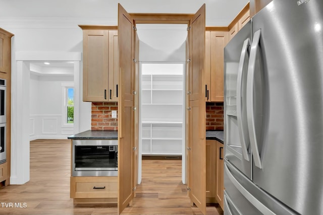330 Bogey Dr, Abingdon, VA 24211 - kitchen with light wood finished floors, stainless steel refrigerator with ice dispenser, and dark countertops