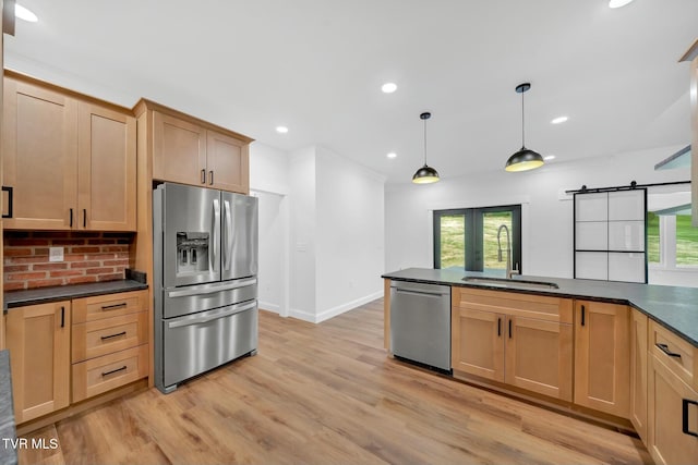 330 Bogey Dr, Abingdon, VA 24211 - kitchen featuring dark countertops, a healthy amount of sunlight, stainless steel appliances, and a sink