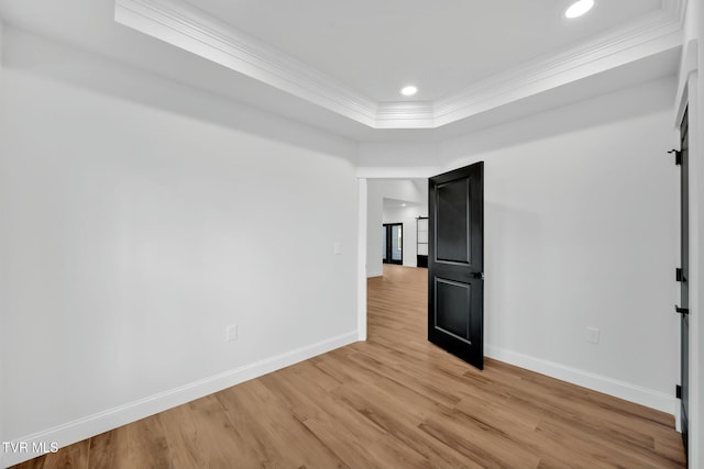 330 Bogey Dr, Abingdon, VA 24211 - empty room featuring baseboards, crown molding, light wood finished floors, and a raised ceiling
