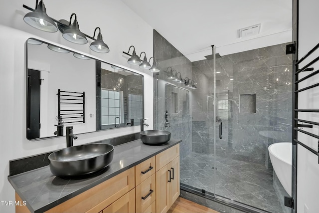 330 Bogey Dr, Abingdon, VA 24211 - full bathroom featuring visible vents, a sink, double vanity, and a stall shower
