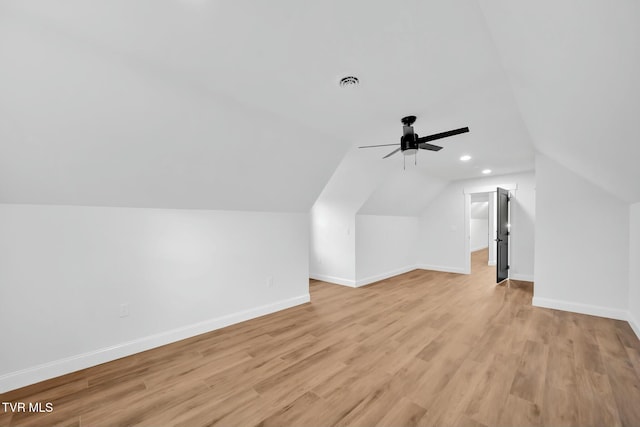 330 Bogey Dr, Abingdon, VA 24211 - additional living space with baseboards, vaulted ceiling, visible vents, and light wood-style flooring