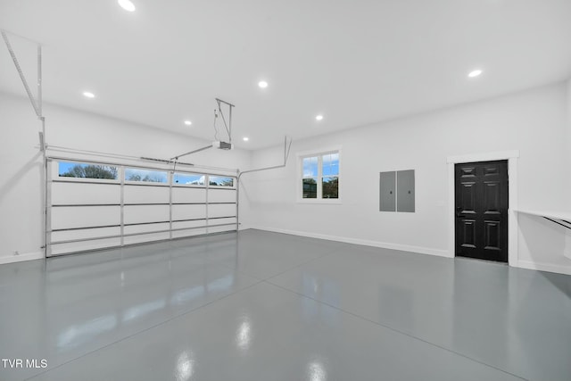 330 Bogey Dr, Abingdon, VA 24211 - garage featuring recessed lighting, baseboards, and a garage door opener