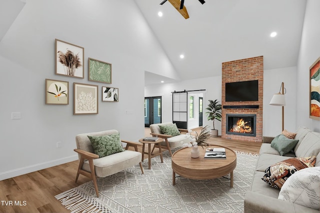 330 Bogey Dr, Abingdon, VA 24211 - living area featuring high vaulted ceiling, a ceiling fan, wood finished floors, baseboards, and recessed lighting