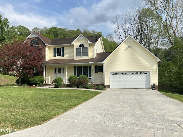 traditional-style home with a porch, an attached garage, a front lawn, and driveway