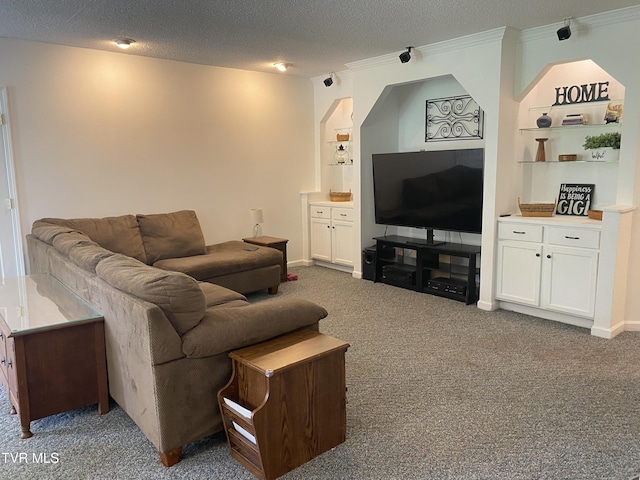 living room featuring baseboards, ornamental molding, carpet flooring, and a textured ceiling