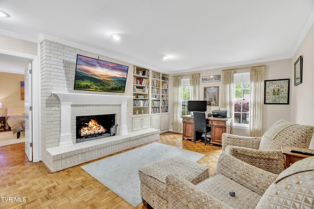 living room with a brick fireplace, built in features, and ornamental molding
