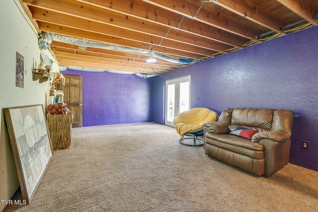 sitting room featuring carpet flooring