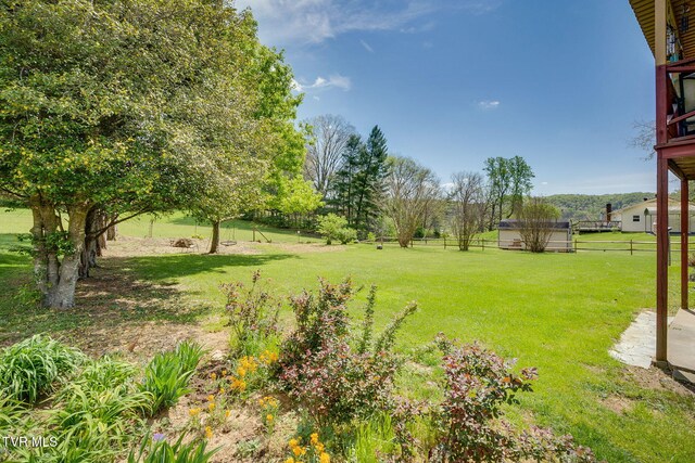view of yard featuring fence