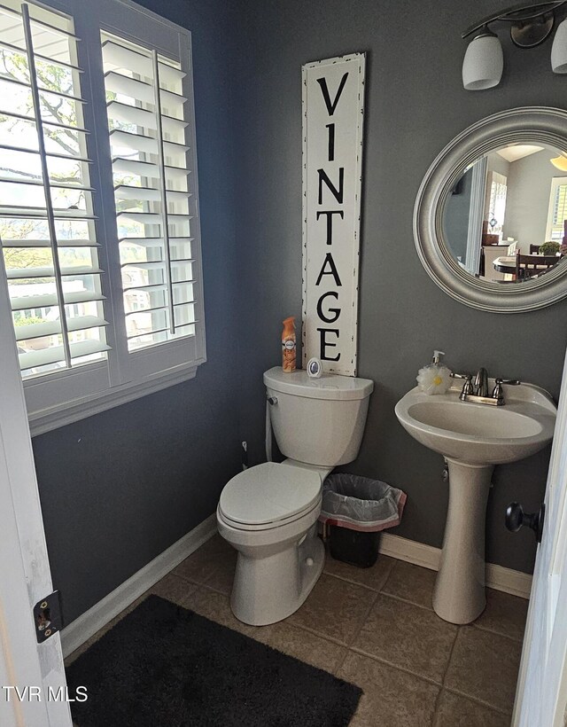 304 Tunnel Dr, Dryden, VA 24243 - bathroom featuring toilet, tile patterned flooring, and baseboards