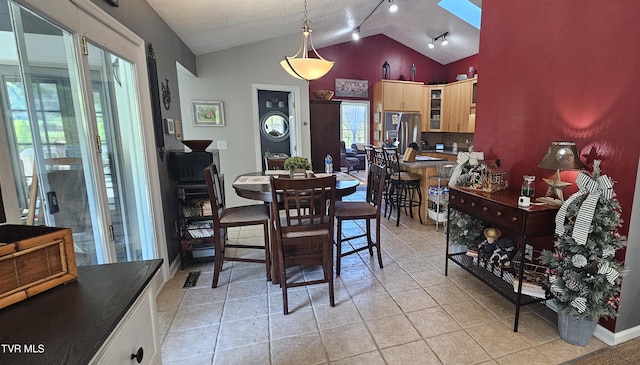 304 Tunnel Dr, Dryden, VA 24243 - dining room with lofted ceiling and light tile patterned floors