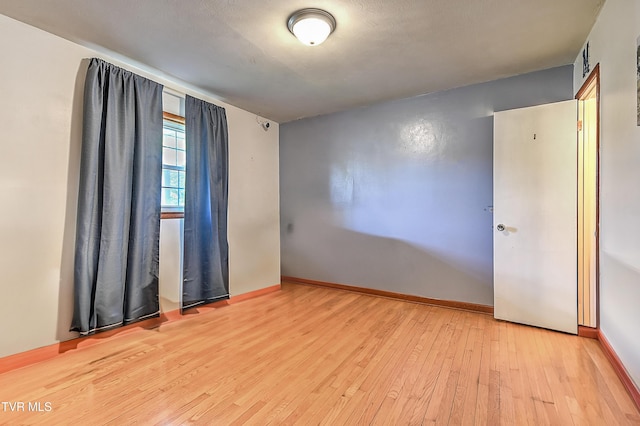2856 Watauga Rd, Johnson City, TN 37601 - empty room featuring hardwood / wood-style flooring and baseboards