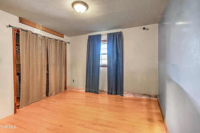 2856 Watauga Rd, Johnson City, TN 37601 - empty room with baseboards and wood finished floors