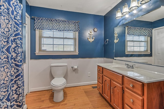 2856 Watauga Rd, Johnson City, TN 37601 - full bath featuring baseboards, wood finished floors, vanity, and toilet