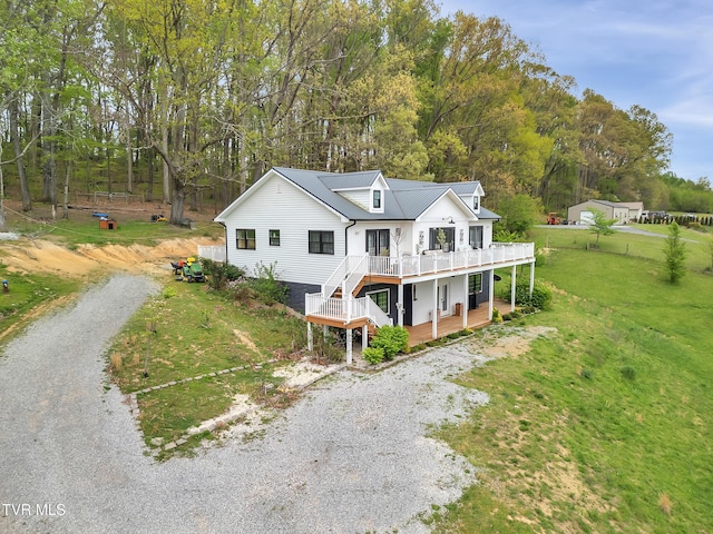 2040 Happy Valley Rd, Limestone, TN 37681 - exterior space featuring a yard, driveway, a wooden deck, and metal roof