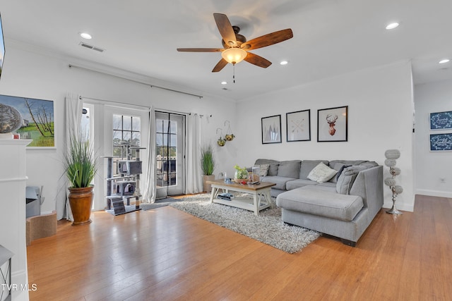 2040 Happy Valley Rd, Limestone, TN 37681 - living area with ceiling fan, a wood stove, baseboards, recessed lighting, and light wood-style flooring