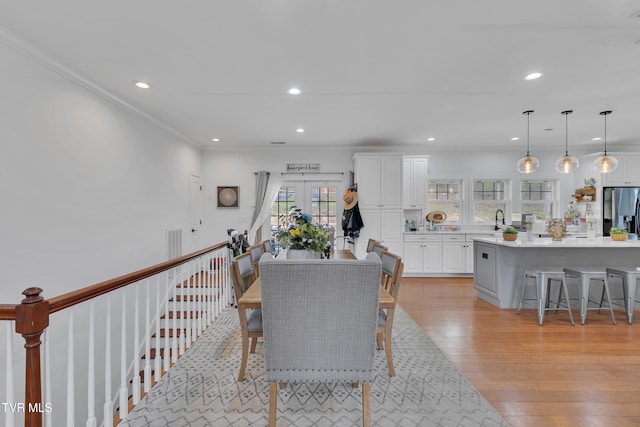 2040 Happy Valley Rd, Limestone, TN 37681 - dining area featuring light wood-style floors, recessed lighting, french doors, and ornamental molding