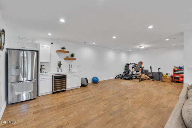 2040 Happy Valley Rd, Limestone, TN 37681 - exercise room with wet bar, baseboards, beverage cooler, light wood-style floors, and recessed lighting