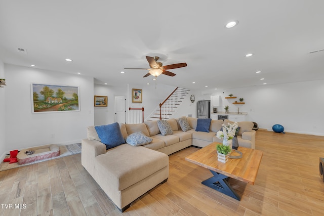 2040 Happy Valley Rd, Limestone, TN 37681 - living area with a ceiling fan, recessed lighting, light wood finished floors, and stairway