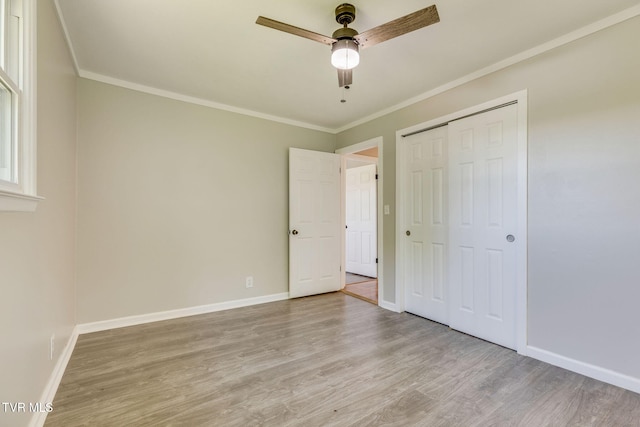 112 Fairwood St, Kingsport, TN 37660 - unfurnished bedroom featuring baseboards, wood finished floors, a closet, and ornamental molding