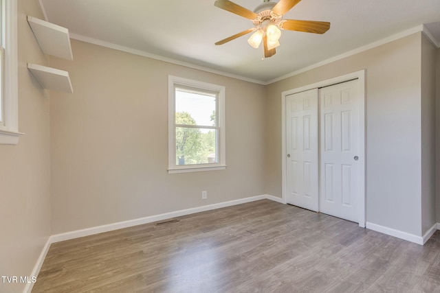 112 Fairwood St, Kingsport, TN 37660 - unfurnished bedroom featuring visible vents, baseboards, wood finished floors, and ornamental molding