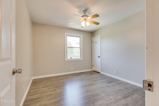 112 Fairwood St, Kingsport, TN 37660 - unfurnished room featuring ceiling fan, baseboards, and wood finished floors