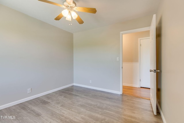 112 Fairwood St, Kingsport, TN 37660 - spare room with baseboards, wood finished floors, and ceiling fan