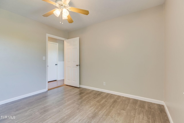 112 Fairwood St, Kingsport, TN 37660 - empty room with light wood finished floors, a ceiling fan, and baseboards