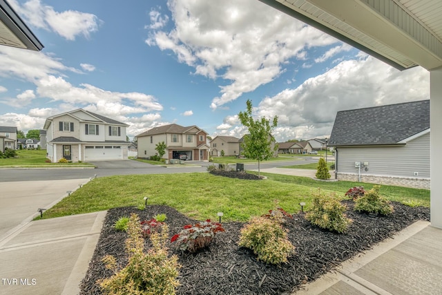 1447 Lemongrass Dr, Jonesborough, TN 37659 - view of yard with concrete driveway, an attached garage, and a residential view