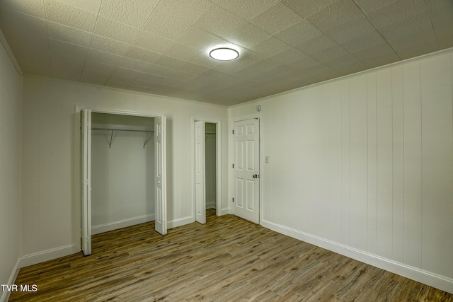 908 Columbia Rd, Bristol, TN 37620 - unfurnished bedroom featuring baseboards and wood finished floors