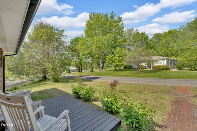 deck featuring a lawn