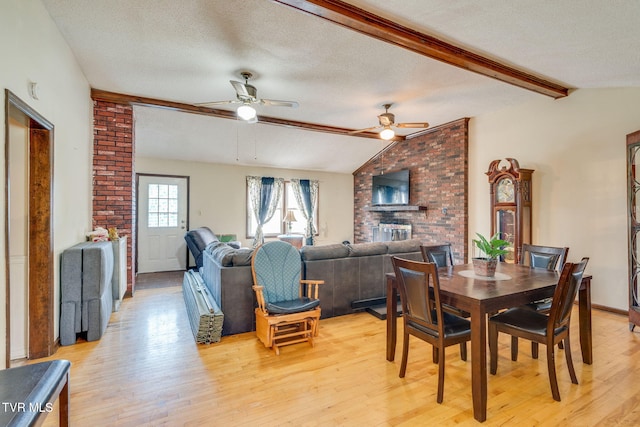 226 Delaney St, Bristol, TN 37620 - dining area featuring a ceiling fan, vaulted ceiling with beams, a textured ceiling, and light wood-type flooring