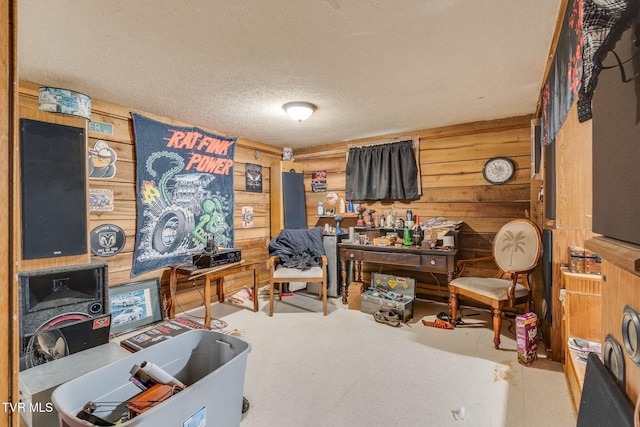 226 Delaney St, Bristol, TN 37620 - home office with a textured ceiling and wood walls
