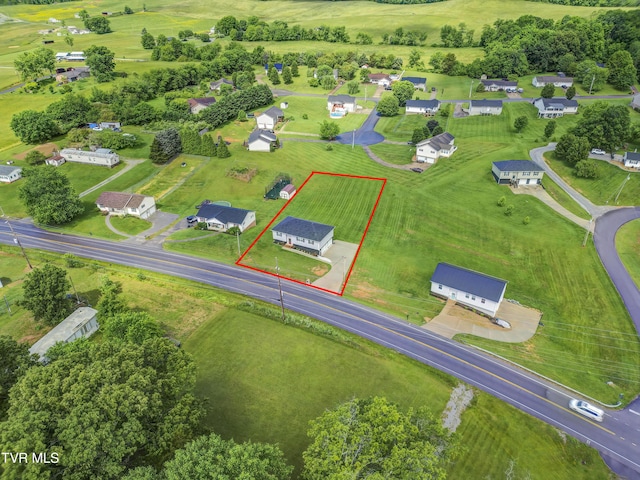 aerial view of property and surrounding area with property boundaries highlighted