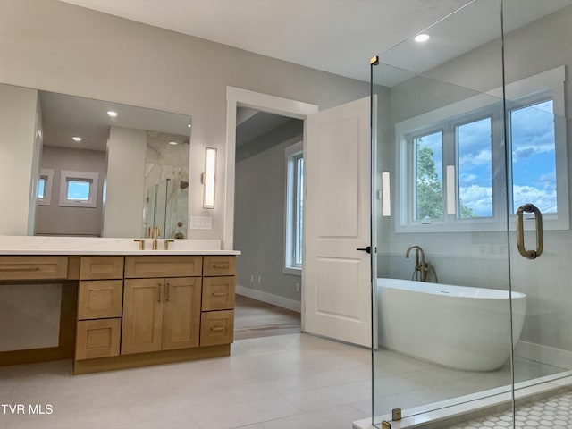 1093 Hawk Nest Ct, Jonesborough, TN 37659 - full bath featuring a stall shower, a soaking tub, vanity, baseboards, and recessed lighting