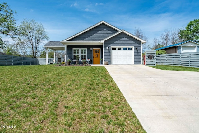 125 Lynn Rd, Johnson City, TN 37604 - view of front of home with a garage, driveway, a front yard, and fence