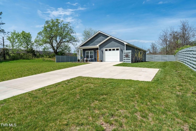 125 Lynn Rd, Johnson City, TN 37604 - view of front of house featuring an attached garage, fence, driveway, and a front lawn