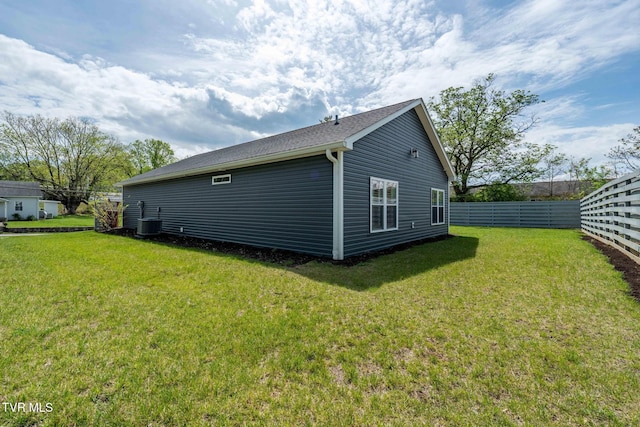 125 Lynn Rd, Johnson City, TN 37604 - view of home's exterior featuring central air condition unit, fence, and a yard