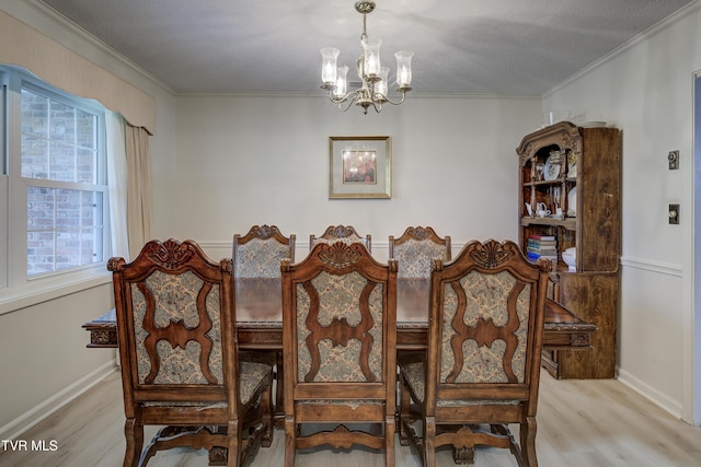 103 Dogwood Ln, Johnson City, TN 37604 - dining space featuring a wealth of natural light, wood finished floors, an inviting chandelier, and crown molding