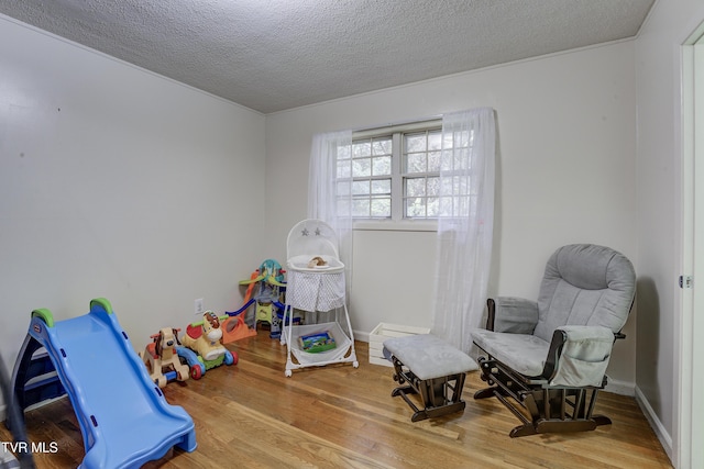 103 Dogwood Ln, Johnson City, TN 37604 - rec room featuring wood finished floors and a textured ceiling