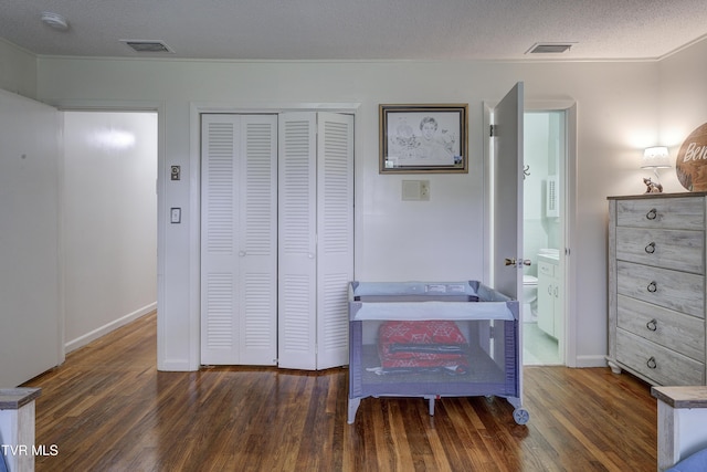 103 Dogwood Ln, Johnson City, TN 37604 - bedroom with visible vents, baseboards, wood finished floors, and a closet