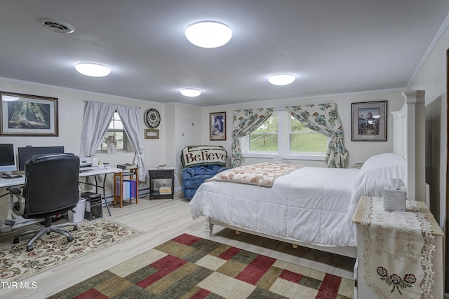 103 Dogwood Ln, Johnson City, TN 37604 - bedroom with ornamental molding, wood finished floors, multiple windows, and visible vents
