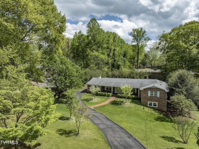 103 Dogwood Ln, Johnson City, TN 37604 - single story home with brick siding, a chimney, a front yard, and aphalt driveway