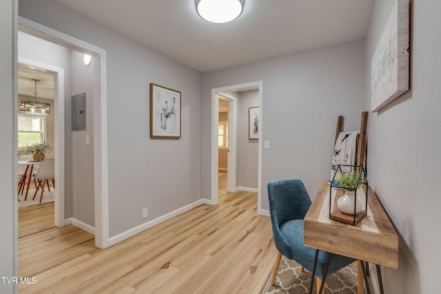 128 Highland St, Gate City, VA 24251 - hallway featuring baseboards, light wood-style floors, and electric panel