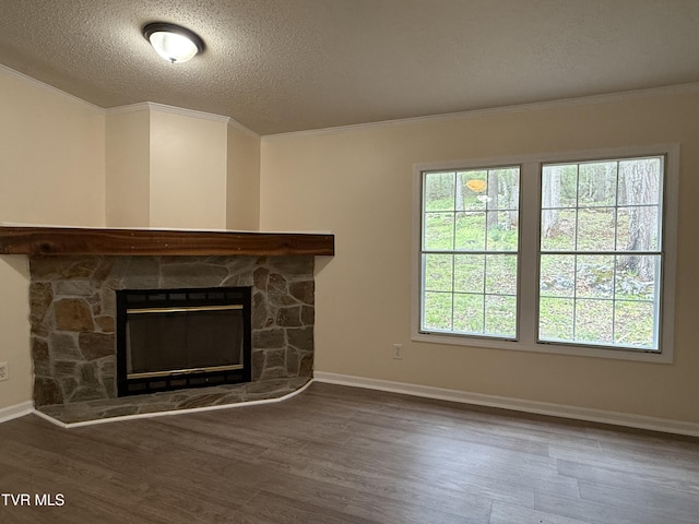 136 Gentry Mountain Rd, Erwin, TN 37650 - unfurnished living room with baseboards, ornamental molding, a textured ceiling, and wood finished floors
