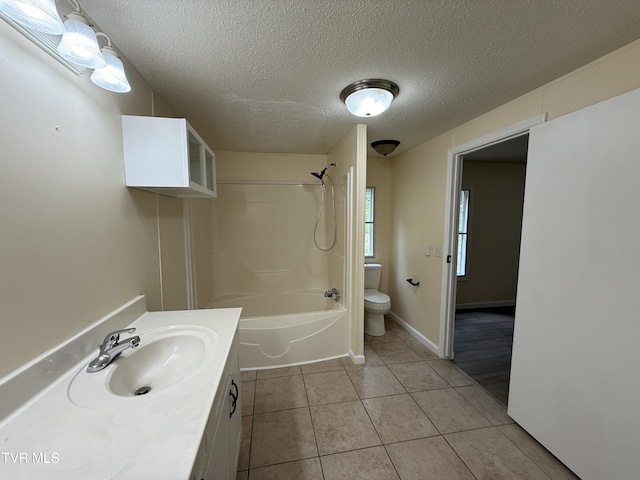 136 Gentry Mountain Rd, Erwin, TN 37650 - full bathroom with tile patterned flooring, vanity, toilet, a textured ceiling, and shower / bathing tub combination